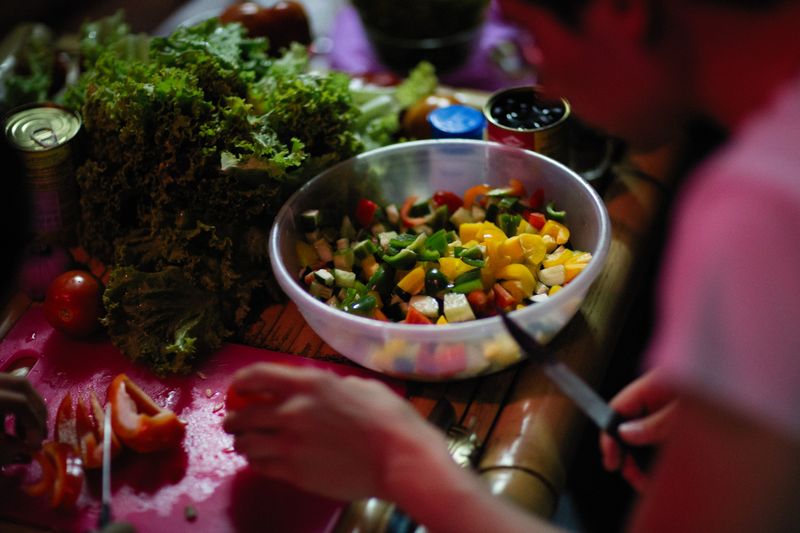 Chopt kitchen team preparing fresh salads and grain bowls