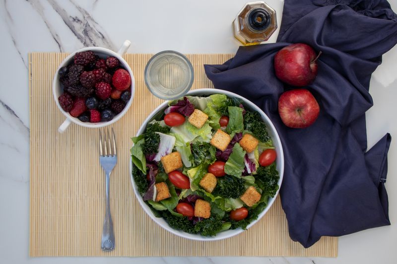 Vegan harvest salad with roasted sweet potato and kale