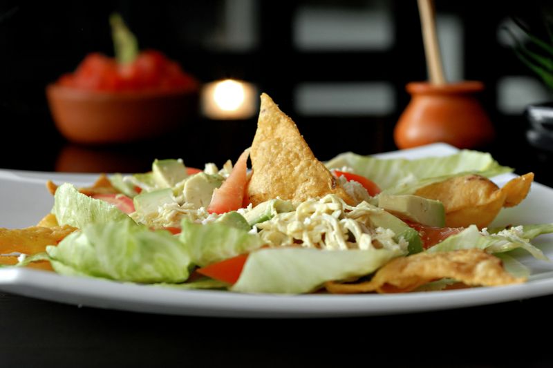 Chicken tortilla soup with avocado and crispy tortilla strips