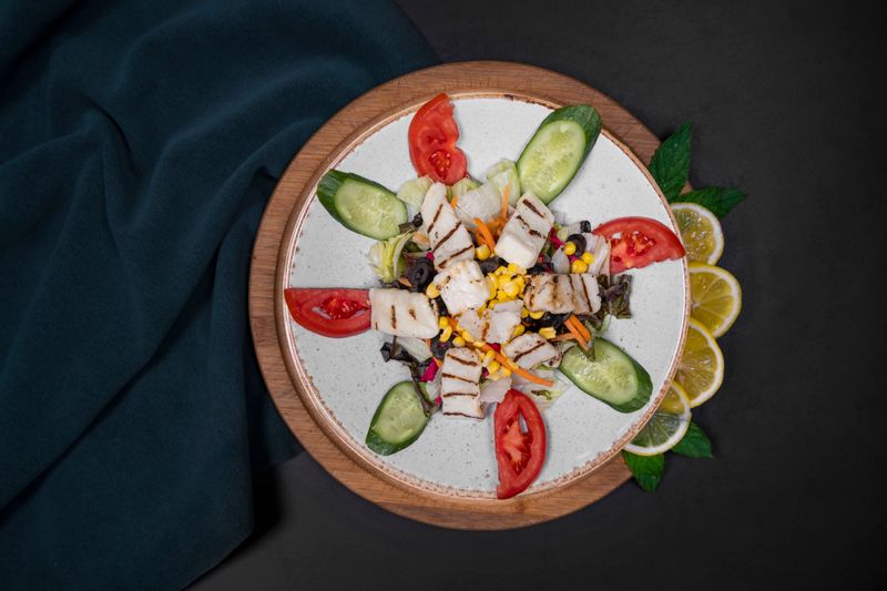 Seasonal fruit cup with honey-lime drizzle